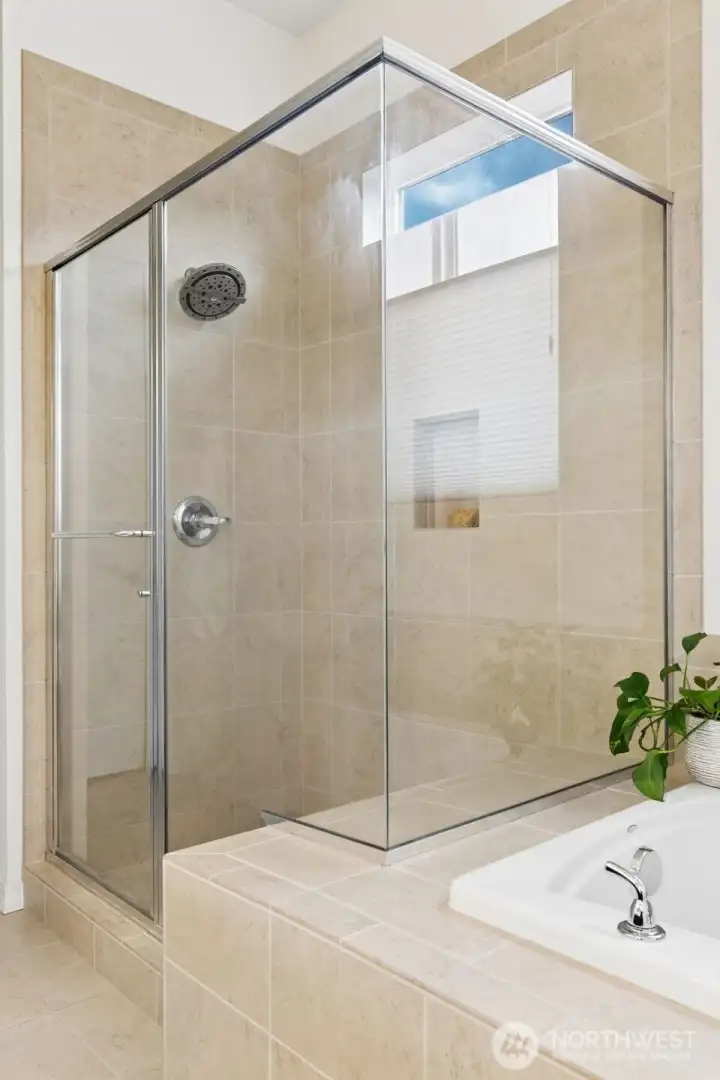 Separate shower with tile surround