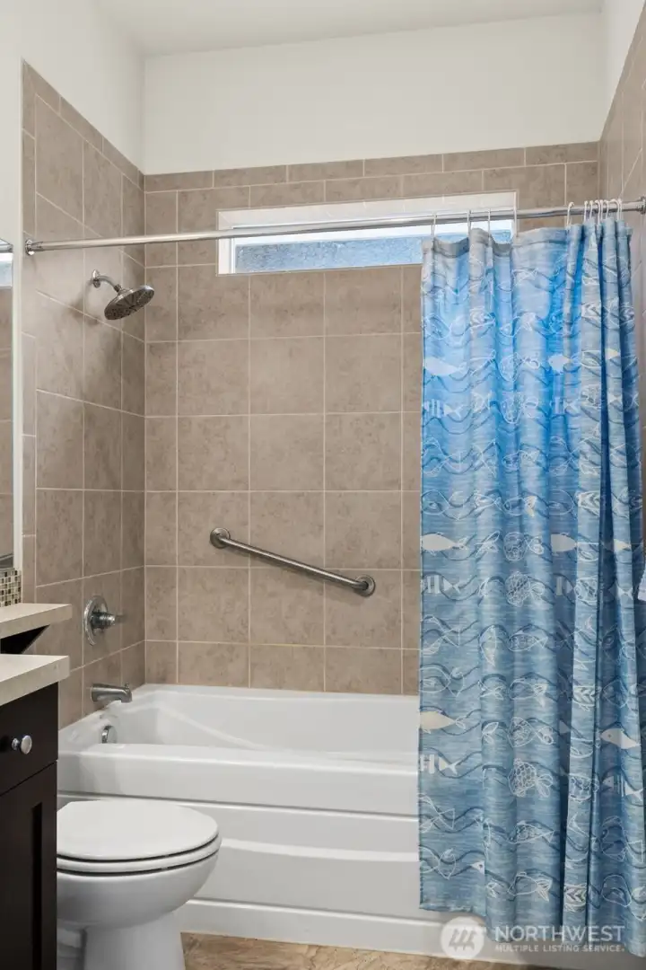 Tile surround with window lets in lots of natural light