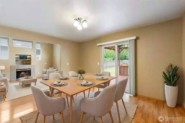Dining room looking into living room virtually staged