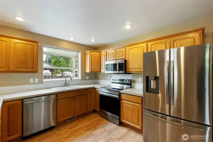 Well designed kitchen with room