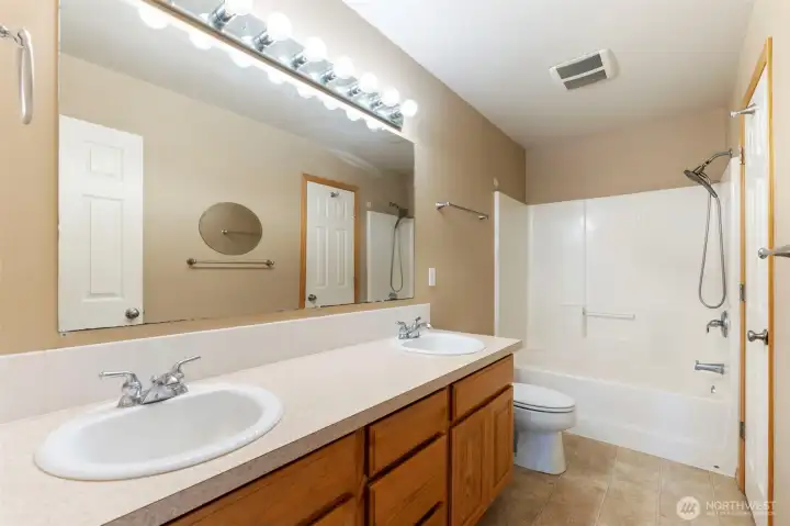 Primary bath with linen closet inside