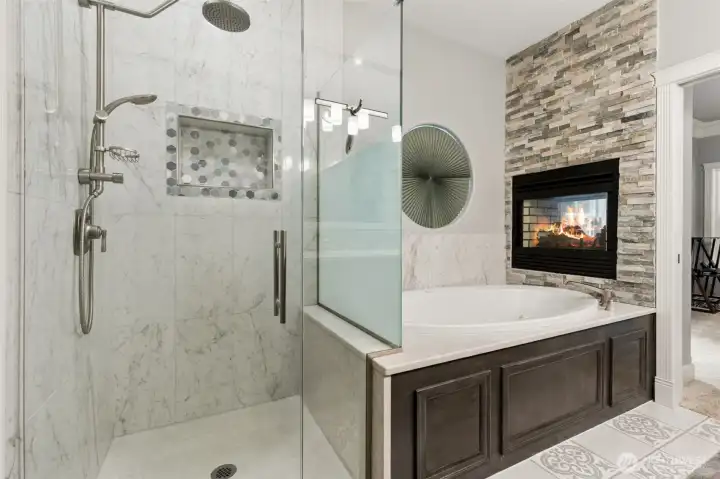 Luxurious Primary EN-suite with soaking tub and fireplace