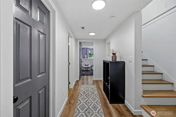 Let's go downstairs. There are 2 bedrooms,  with walk-in closets and a nook for storage or hide and seek!