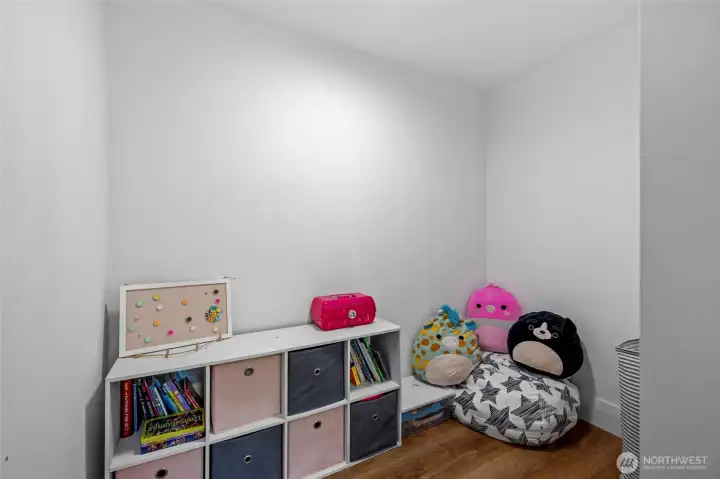 Walk in closet in one of the rooms downstairs. Clean slate for you to hang or shelve as you wish.