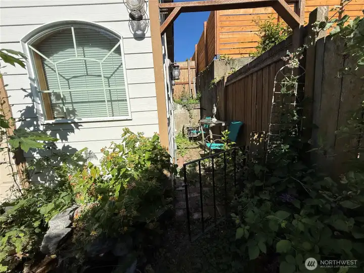 Backyard garden patio outside craft/hobby shed. Backyard garden patio outside craft/hobby shed.