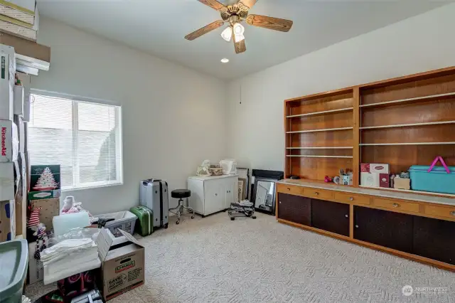 Bedroom #3. Extra large, with extra-tall ceiling. Has previously served as a craft room and an exercise room. What purpose will this great space serve for you?