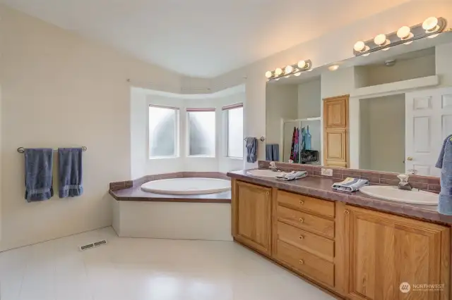 Primary bath features double vanity, garden tub and a walk-in shower!