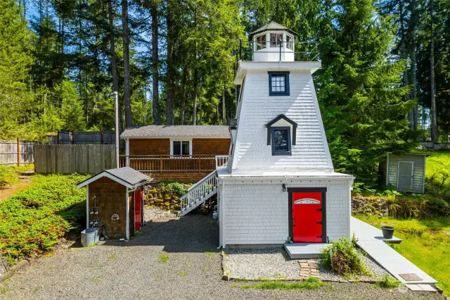 This four story lighthouse, built in 1997, is a replica of an 1854 lighthouse on the James river in Virginia. Inside, it is an amazing home. Sitting behind the lighthouse is the separate cabin that has been a rental. The property is .44 acres. This property is a must-see opportunity.