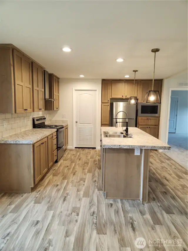 Door from kitchen leads to the utility room