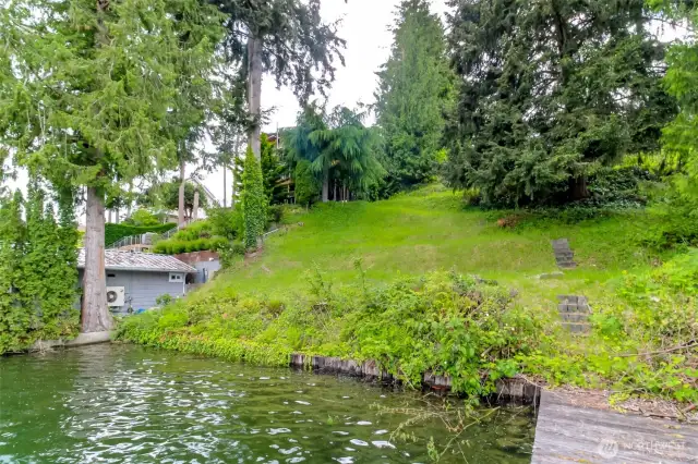 View of lower property looking up from boat dock