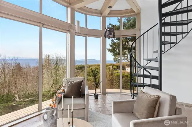 the 'Sunset  View' room  . . .  has a spiral staircase to  . .