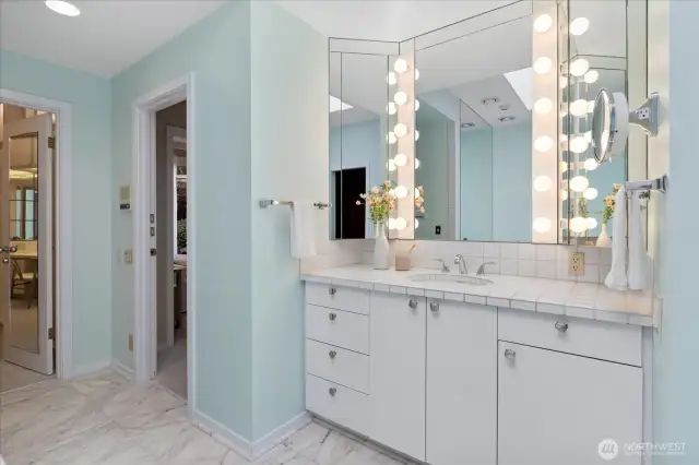 Primary bath is generous and original, with two generous his/hers closets and dressing areas.