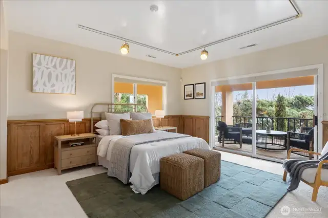 Lower level features large bedroom/ study area with a 3/4 bath and generous covered deck - ideal for guests or a caregiver! Has its own private entrance!