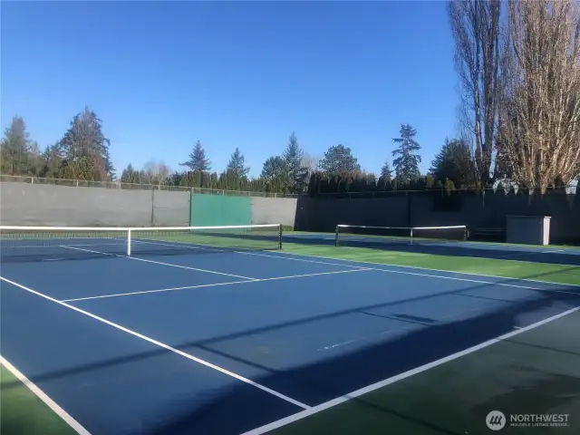 The tennis courts are adjacent to the pool and clubhouse. Basketball and pickle ball are available at the nearby community park.