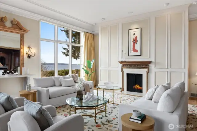 . . .12' ceilings, paneled walls and custom coved crown molding . . . adding