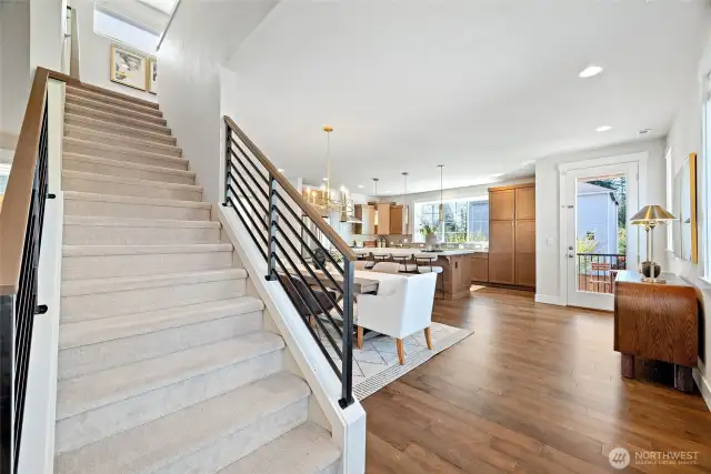 Sleek metal rail adds a touch of style and increases the visual square footage of the space.