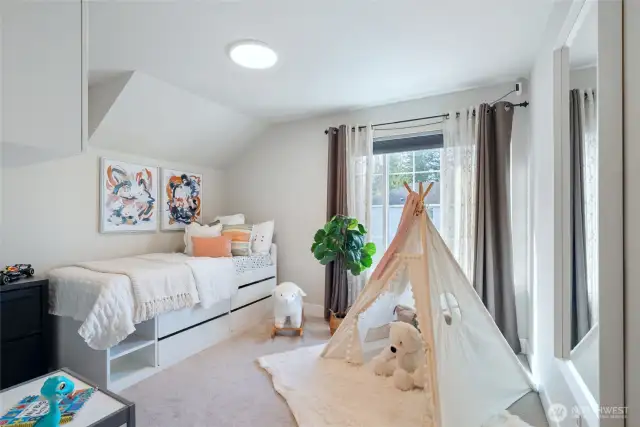 The super adorable and light-filled kid's room.