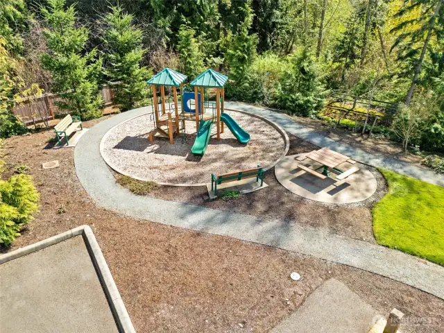 The community playground is just steps away from the home.
