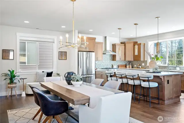 Open-concept living with the dining and kitchen in view.
