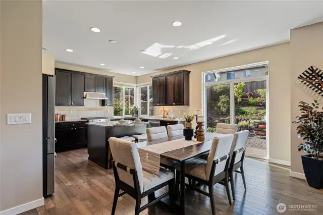 Love the open floor plan which allows easy flow and communication between the kitchen and family room.