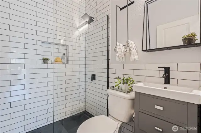 Main floor remodeled bathroom with new shower for added convenience (3rd shower).