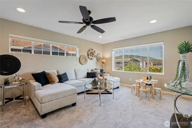This bonus area/loft is a great space for media room, game room, or play room. It comes with an incredible Mt. Rainier view too!