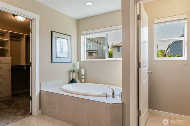 Primary sunken tub - a place to relax inside.