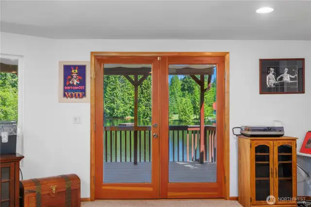 French doors leading to the 2nd covered deck looking to the lake.