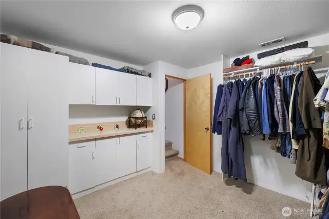 Bonus room acting as a walk-in closet.