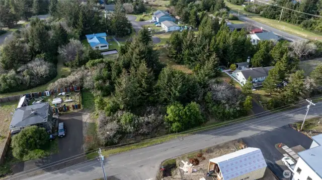 Sizable lot - build separate properties or combine the lot.