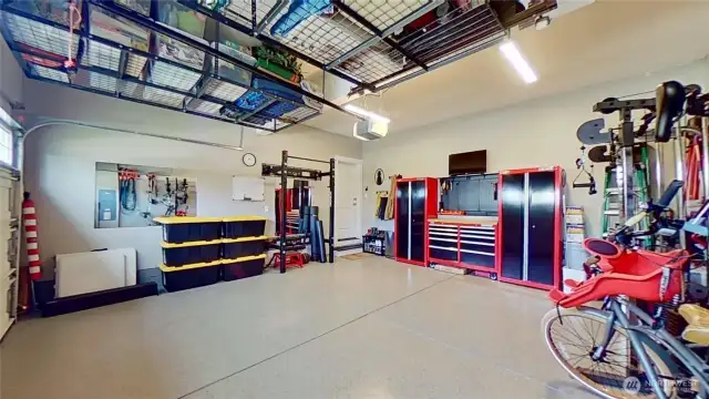 Garage with epoxy floors and hanging storage racks