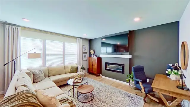 Living room with wiring for flush-mount TV
