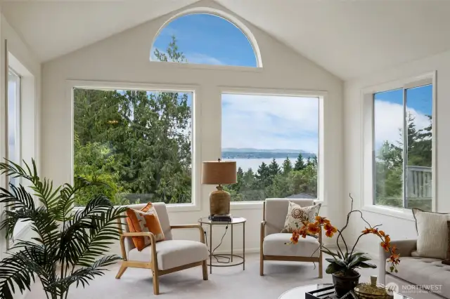 A closer look at the picture-perfect water view captured from the living room. This intimate sitting area offers a front-row seat to the ever-changing beauty beyond.
