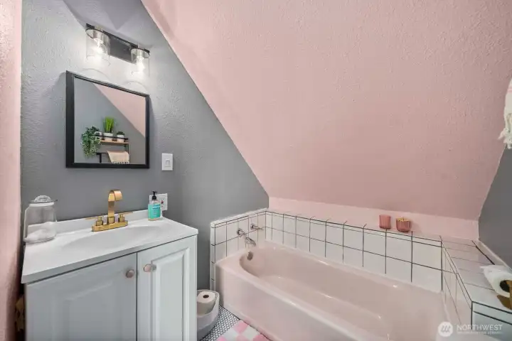 Updated vanity, lights, toilet, flooring in upstairs BA