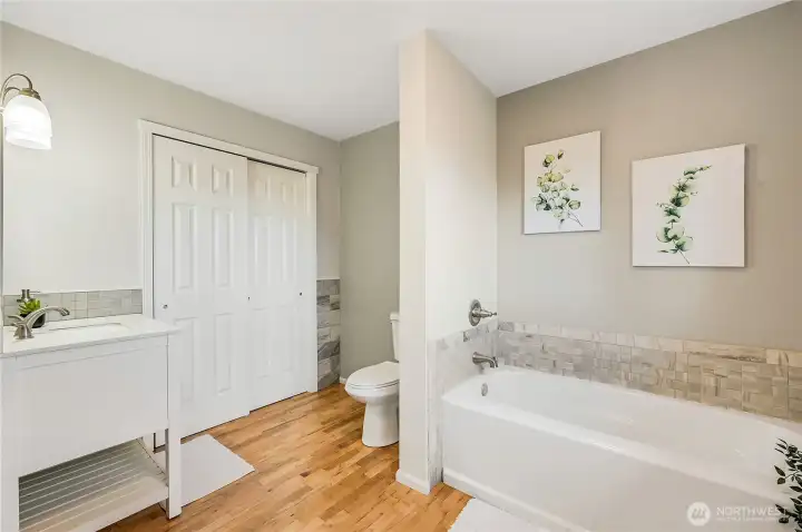Soaking tub in primary bathroom