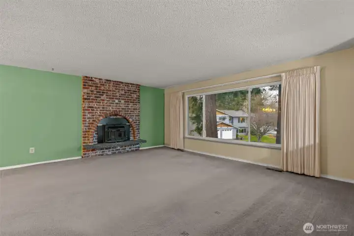 Living Room w/ Wood Burning Fireplace Insert