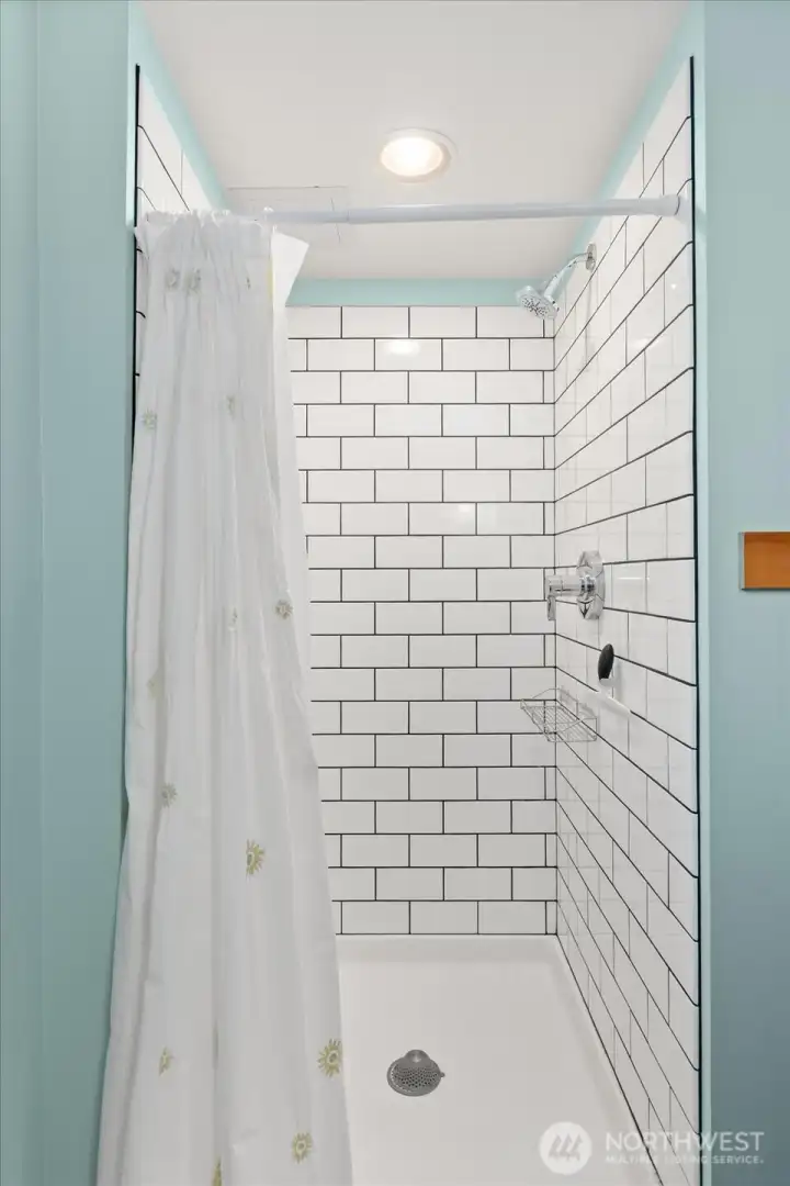 Lower level tile shower
