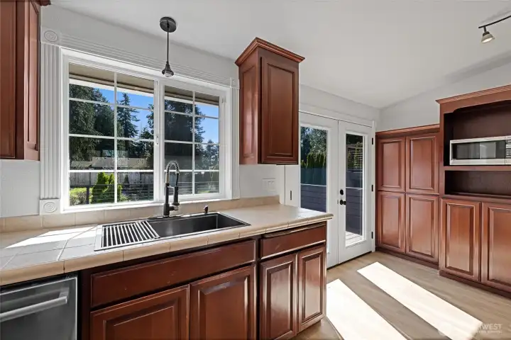 Enjoy looking out the window to your huge back yard