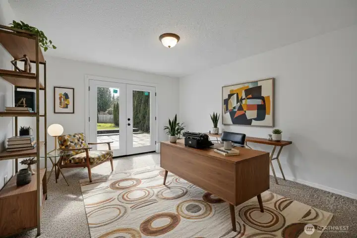 Here's the virtually staged office that can also be a bedroom.  Brand new French door!!