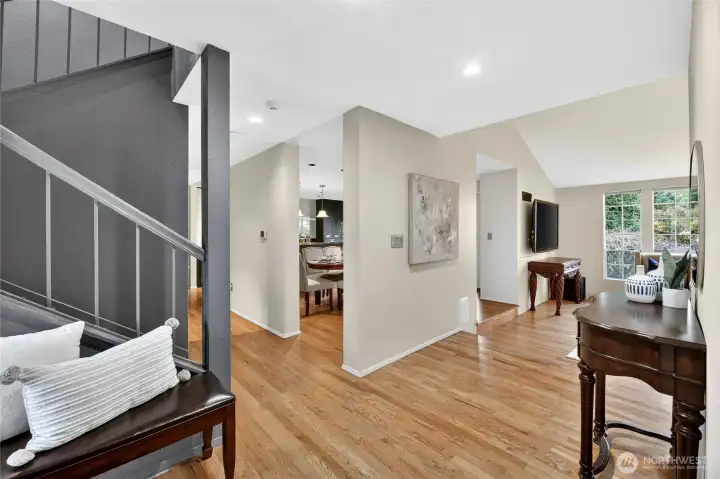 Open, light-filled layout with hardwood floors, neutral tones & seamless flow to dining & living areas. Inviting design perfect for everyday living & entertaining.