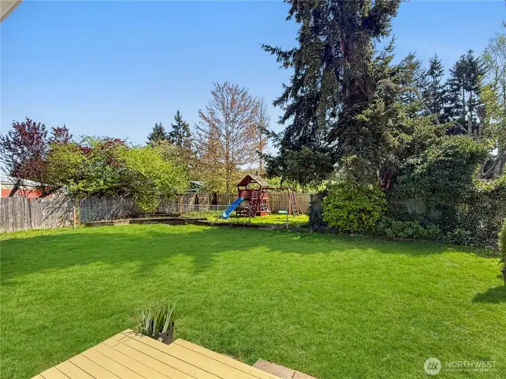 View from 2nd deck located off huge familyroom, playground stays