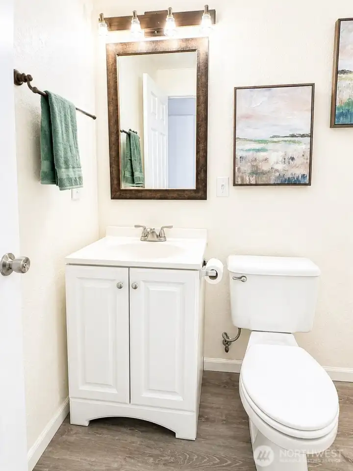 Half Bath also has space for full size washer and dryer. This bathroom has all new plumbing in 2024