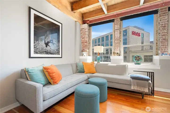 The inviting living room offers the perfect space to entertain friends or unwind with your favorite movie. The inviting living room offers the perfect space to entertain friends or unwind with your favorite movie.