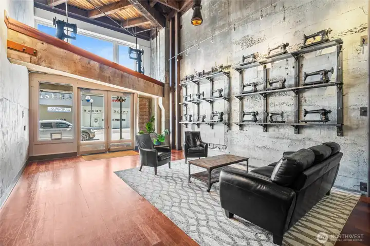 The stunning lobby pays tribute to the building's history with vintage Singer sewing machines displayed as artwork. The stunning lobby pays tribute to the building's history with vintage Singer sewing machines displayed as artwork.