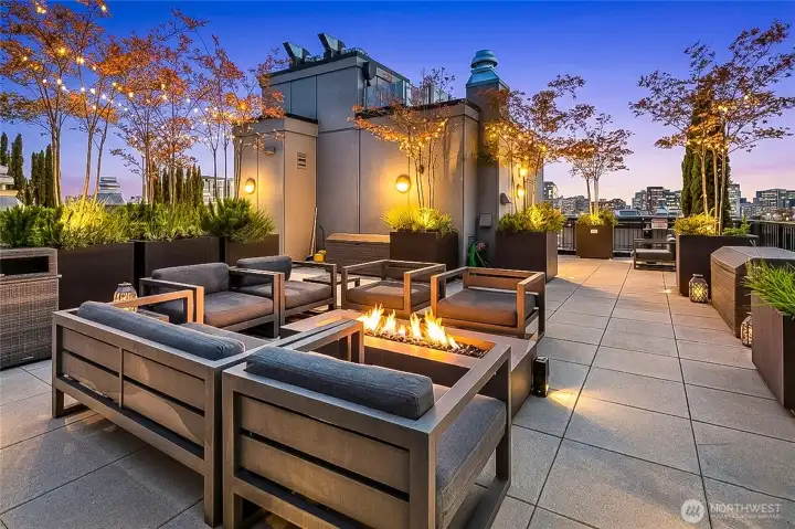 Gather around the rooftop fire pit while taking in spectacular evening views of the Seattle skyline. Gather around the rooftop fire pit while taking in spectacular evening views of the Seattle skyline.