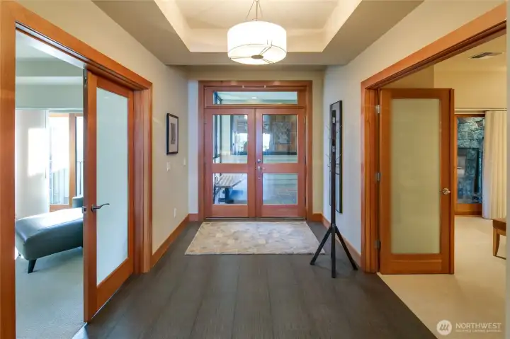 Welcome inside this lovely condo! To the left is the primary suite and to the right is the 2nd suite. The entry is very spacious and open.