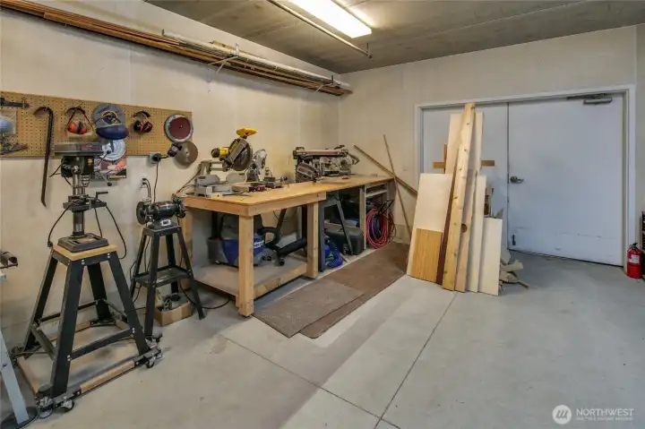 This common workshop in on the ground floor beneath the common garage, and has been much improved since this photo was taken...it is really nice now!