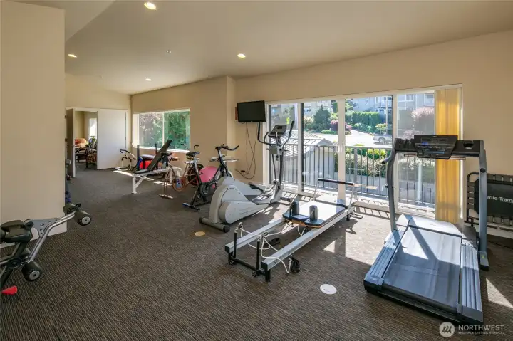 There is a fully equipped work out room above the Southerly garages. There two 3/4 baths and a large meeting room is adjacent.