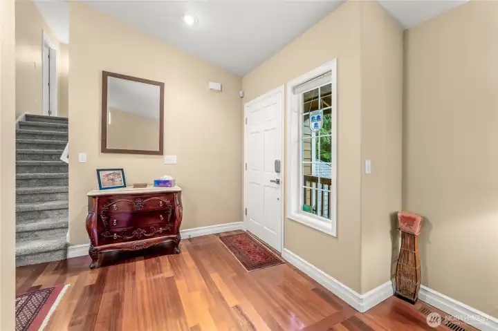 Entry, foyer, and stairs to second level.