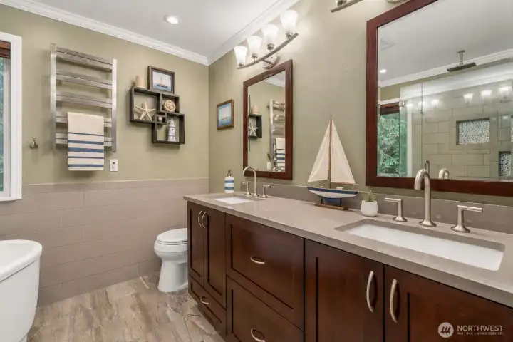 Master bath with heated floor and towel racks.